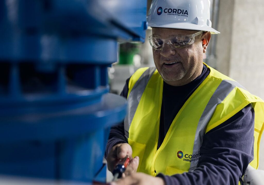 Cordia employee maintaining pipes